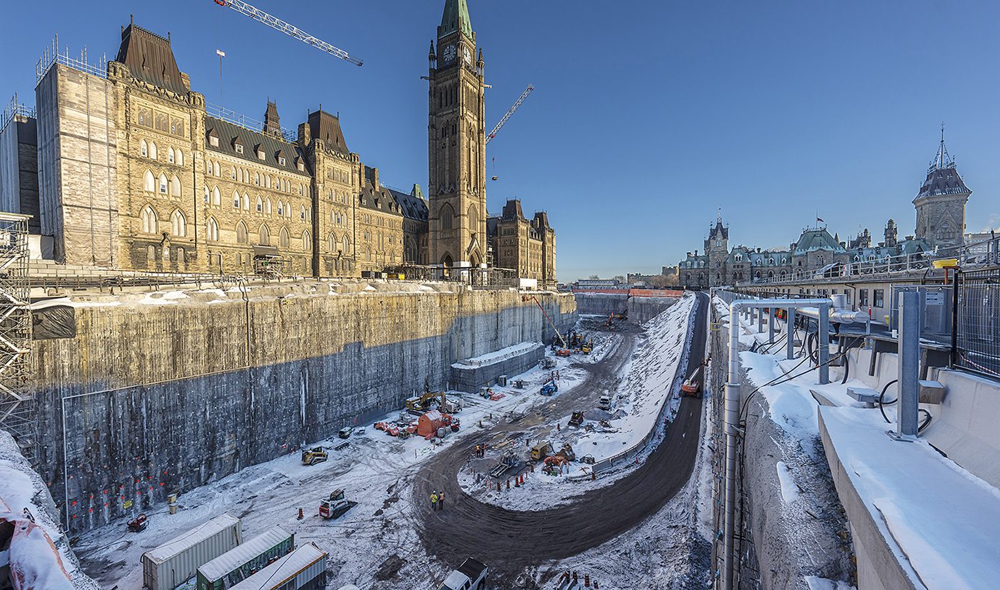 The exterior of Centre Block showing the below-ground hole that's been dug for the future Parliament Welcome Centre.